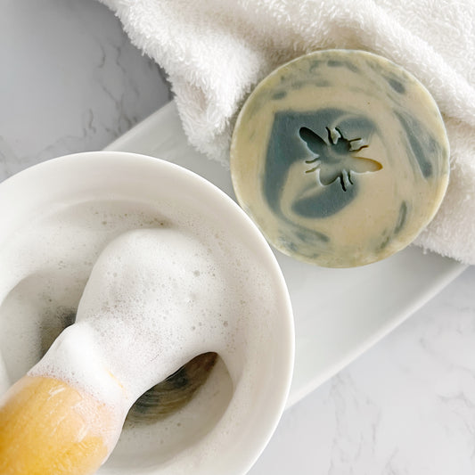 Close Shave Shaving Soap Puck Product with shaving brush sit by Lather and Soul