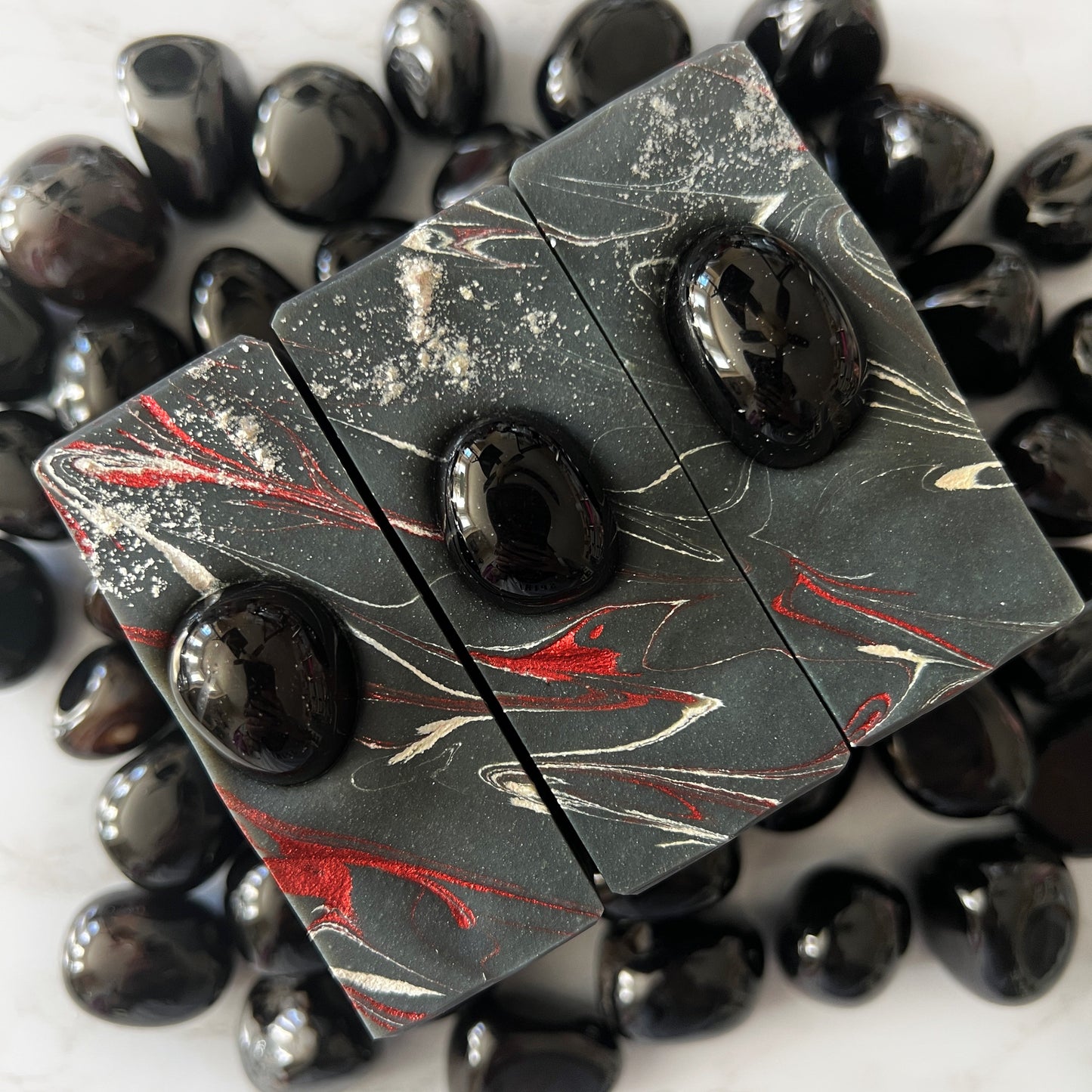 "The Line We Cross" crystal soap with black agate, to fight for immigration rights, humane policy, and justice for families seeking safety and dignity.