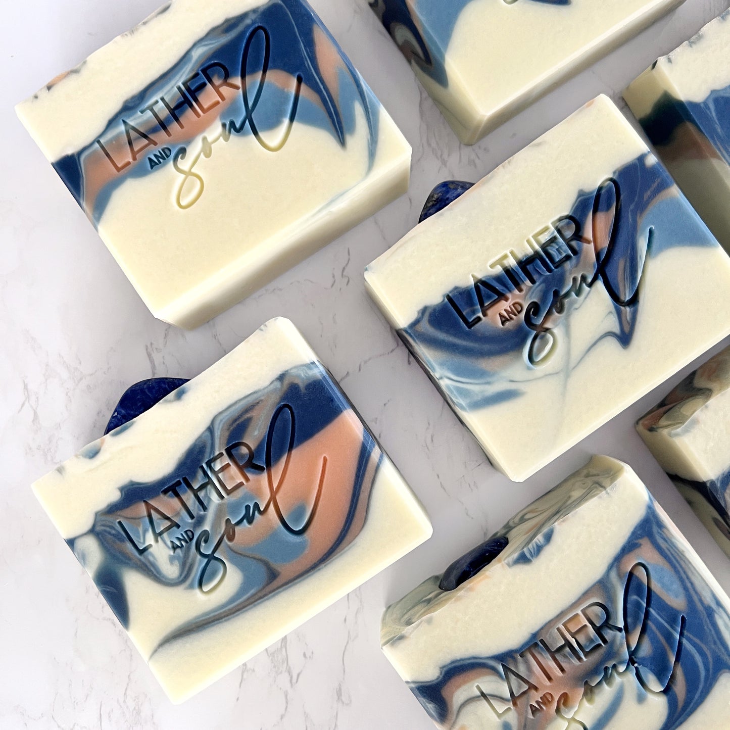 Handmade artisan soaps with real sodalite crystals, from Lather and Soul