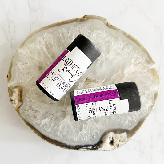 Vegan lip balm in a yummy Grape Soda flavor and in a plant friendly paperboard tube
