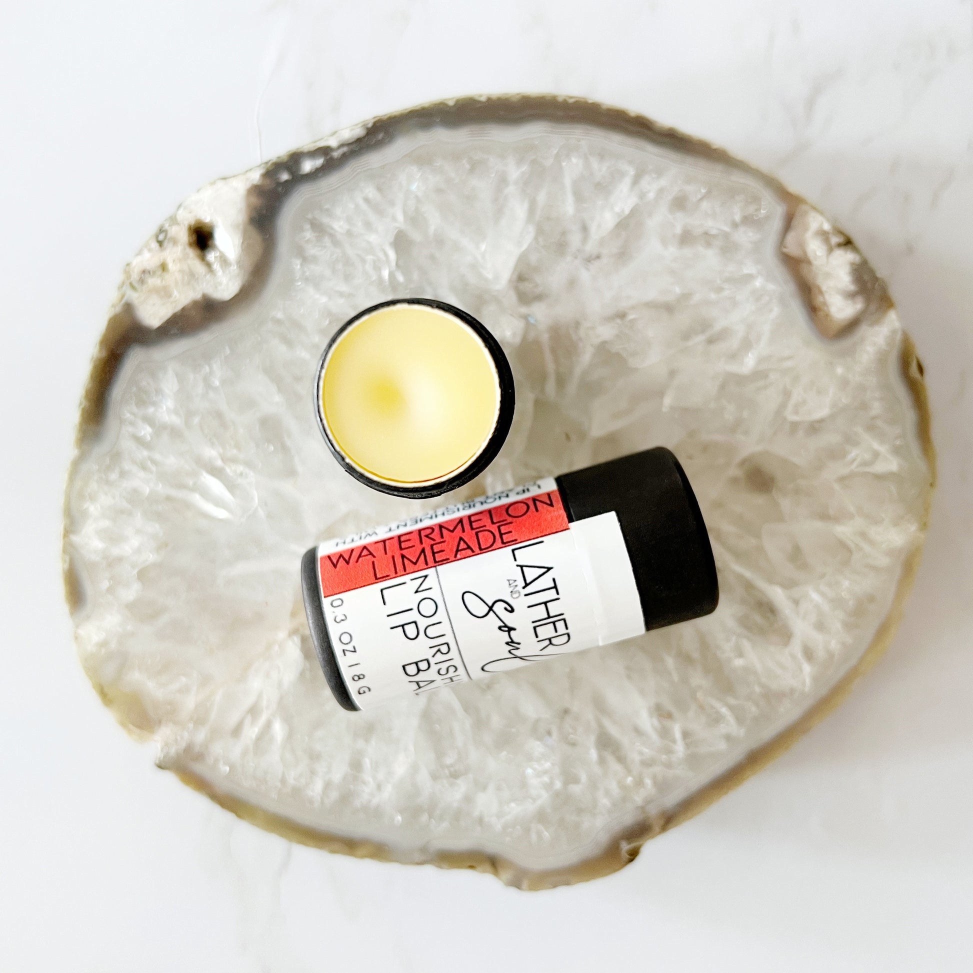 Organic lip balm by Lather + Soul, in watermelon limeade flavor.