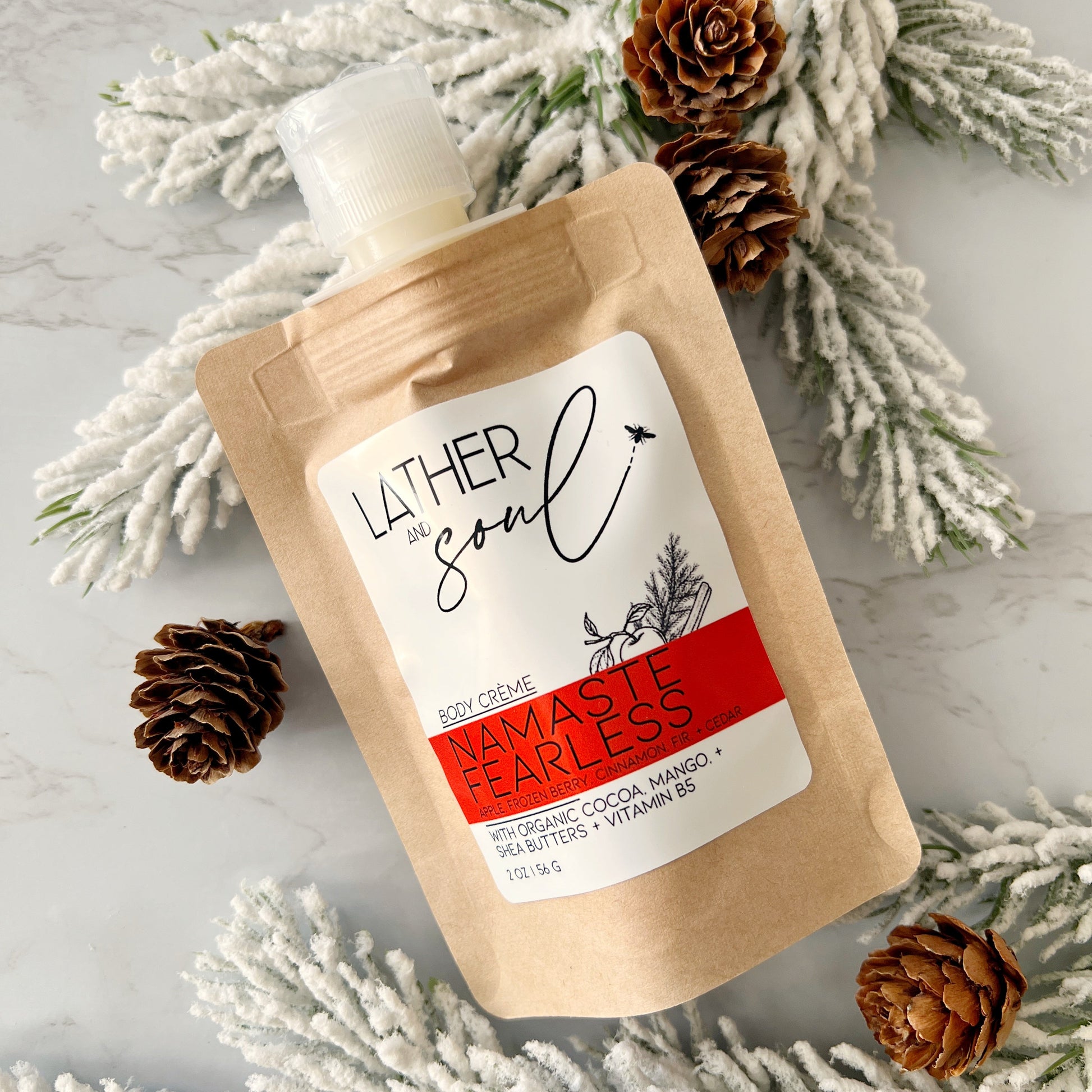 "Namaste Fearless" body crème in travel sized and eco friendly kraft pouch