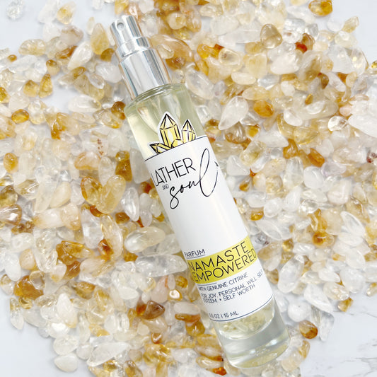 Bottle of 'Namaste Empowered' perfume infused with citrine crystals 