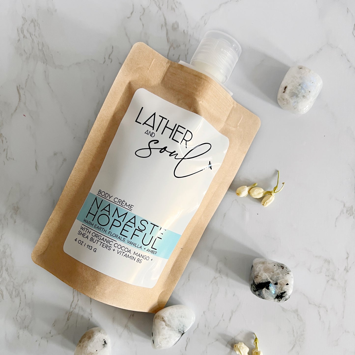 Lather and Soul body crème in eco-friendly kraft pouch in Namaste Hopeful scent.