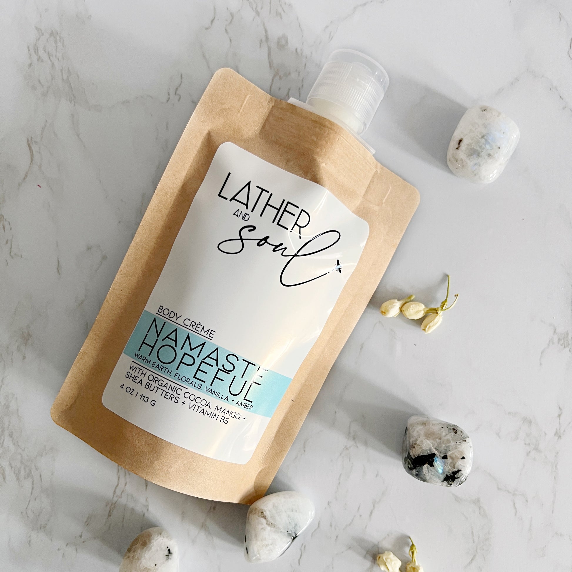 Lather and Soul body crème in eco-friendly kraft pouch in Namaste Hopeful scent.