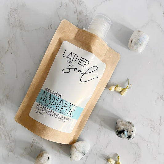 Lather and Soul body crème in eco-friendly kraft pouch in Namaste Hopeful scent.