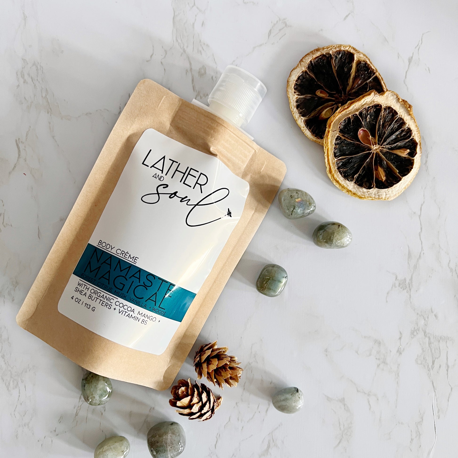 Luxurious body crème by Lather and Soul Skincare in Namaste Magical scent, packaged in eco-friendly kraft pouch.