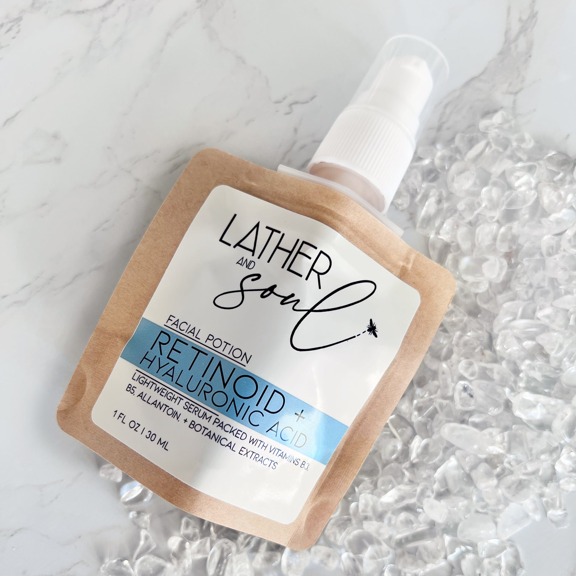 Retinoid serum with hyaluronic acid and botanical extracts, and infused with real crystals