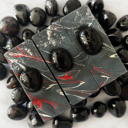 "The Line We Cross" crystal soap with black agate, to fight for immigration rights, humane policy, and justice for families seeking safety and dignity.