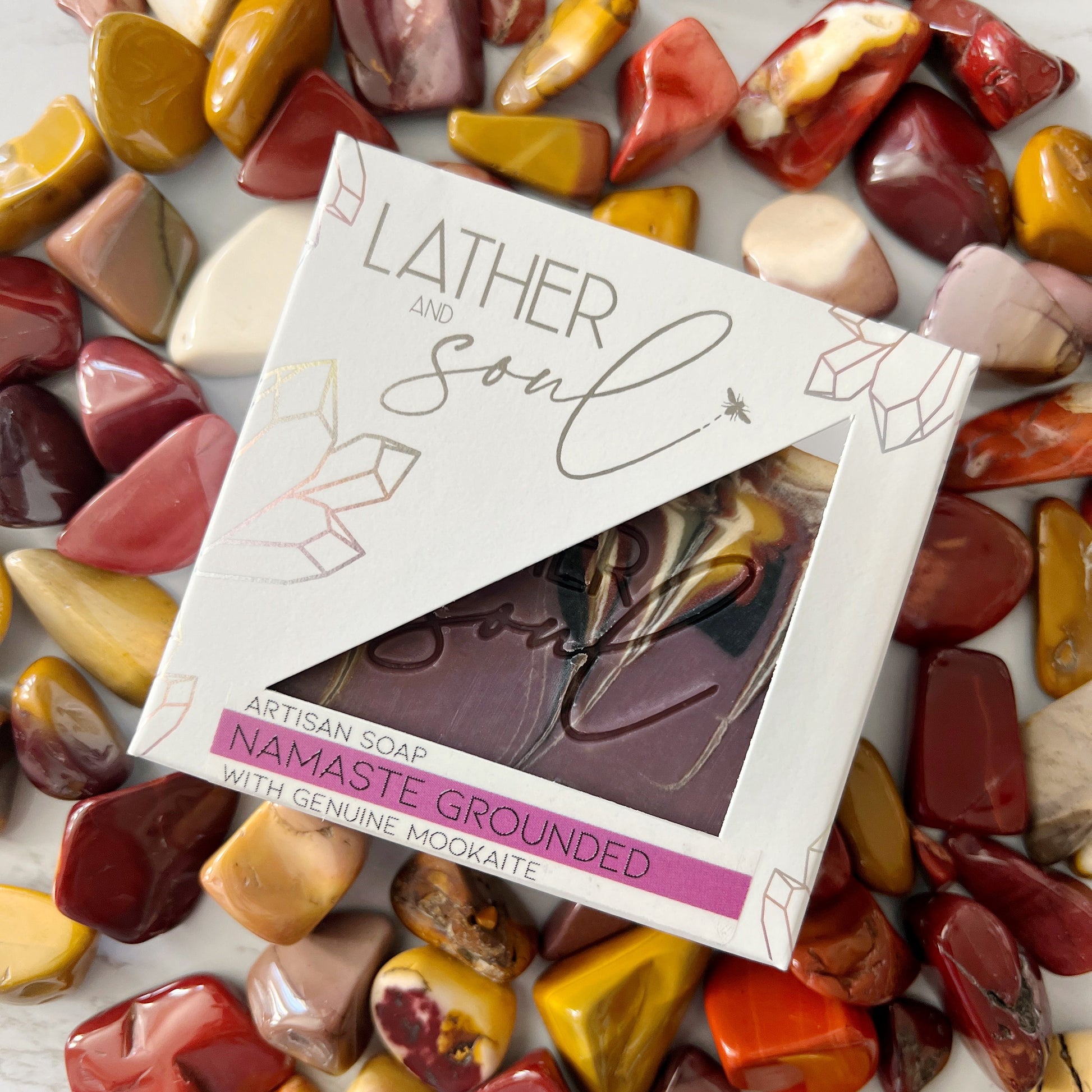 Bring warmth and nurturing with Lather and Soul's "Namaste Grounded" mookaite crystal soap