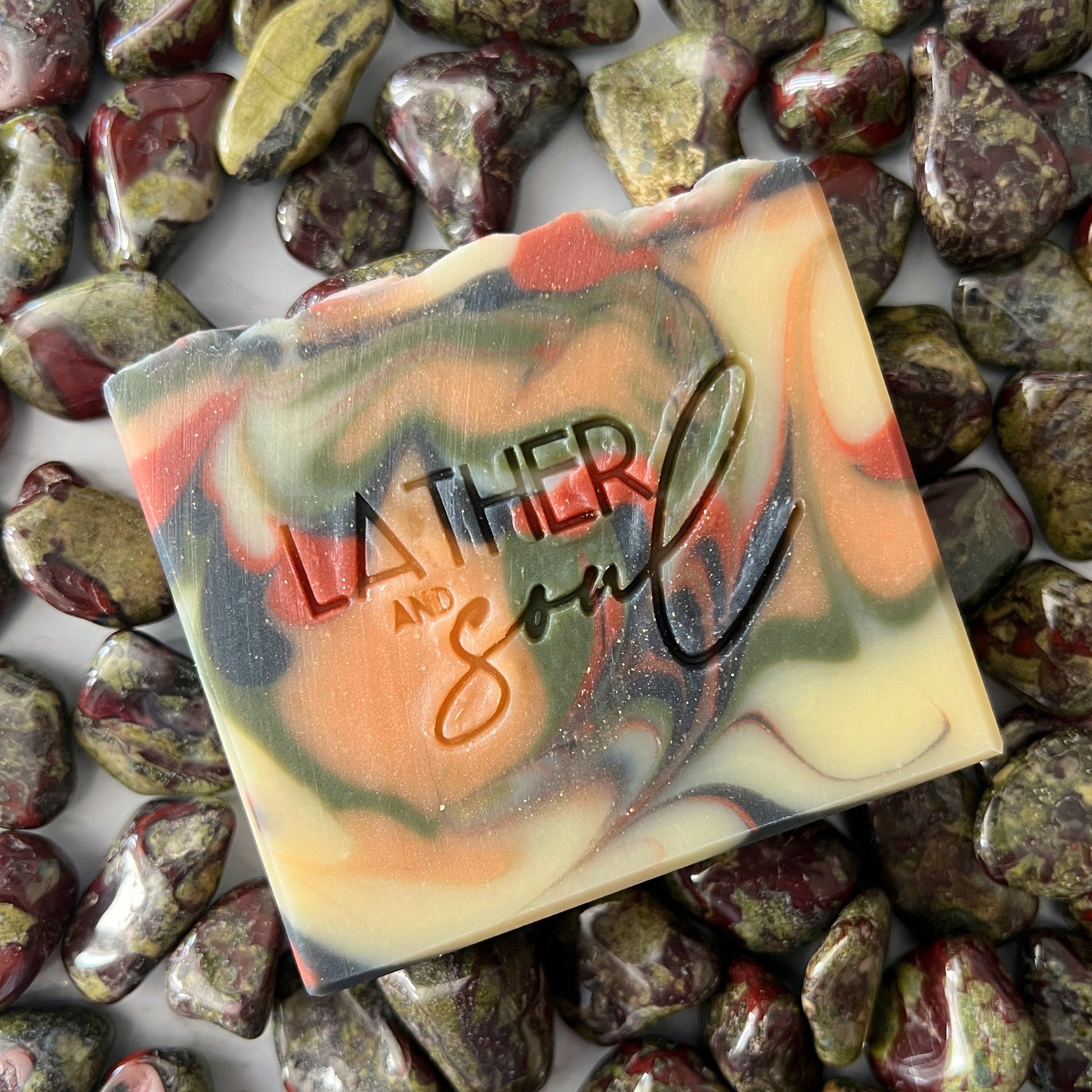 "Untamed" crystal soap, with dragon blood jasper, and supportive causes fighting against domestic violence