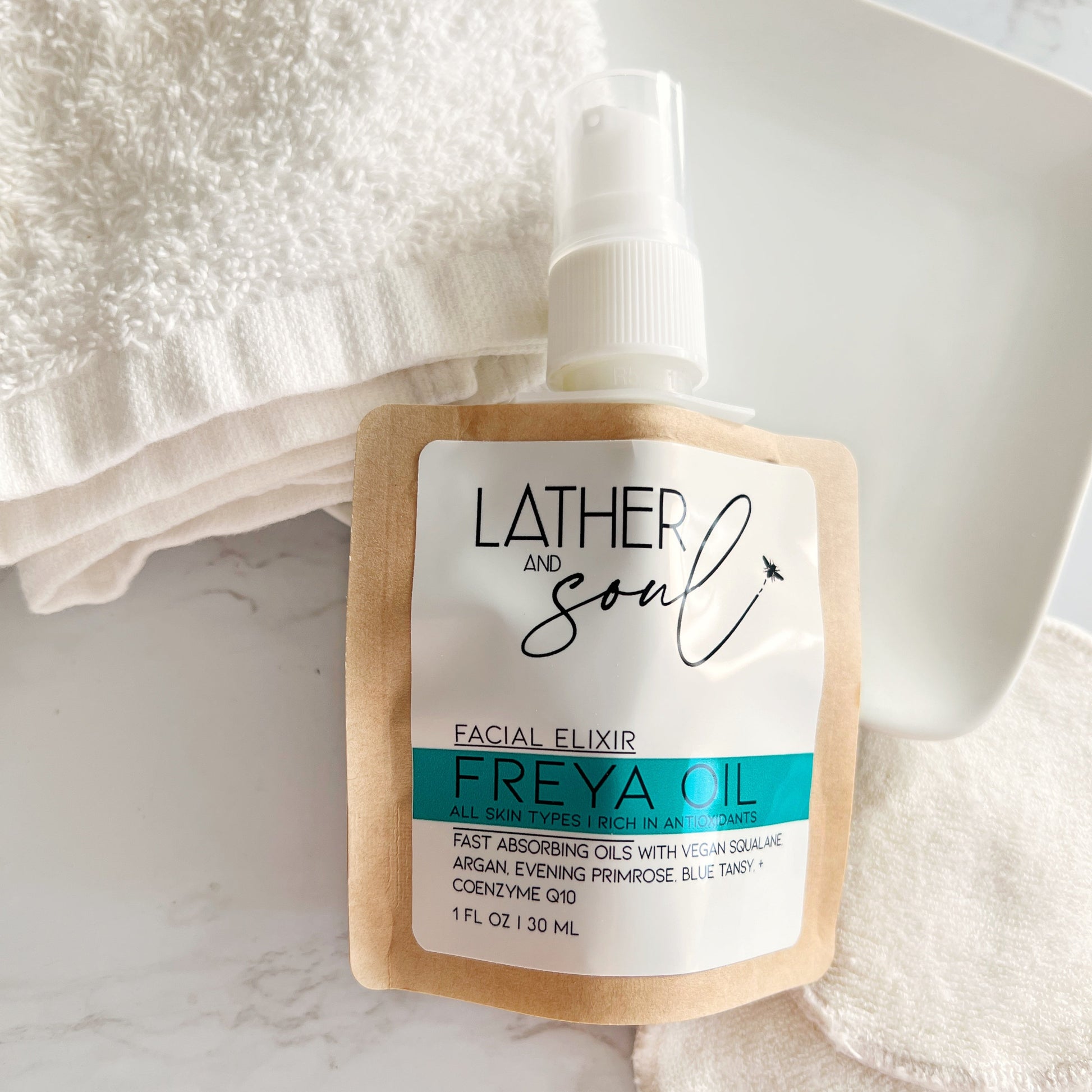 Organic facial oil elixir with CoEnzyme Q10 and plant oils, from Lather and Soul, now in new eco friendly pouches.