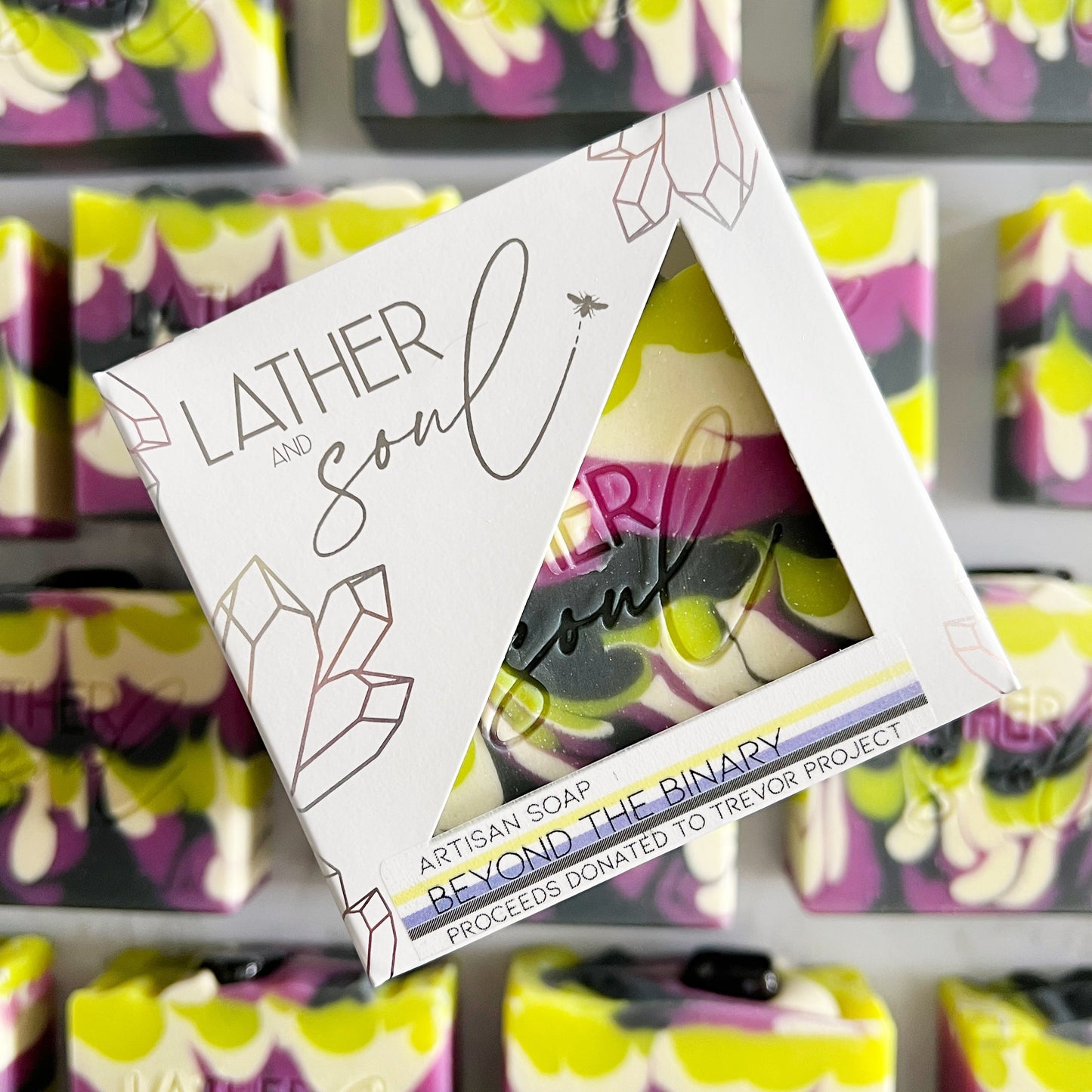 Crystal soaps inspired by the nonbinary flag, from Lather and Soul