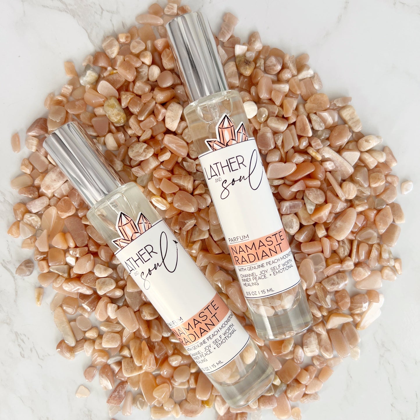 "Namaste Radiant" fine fragrance from Lather and Soul, with genuine peach moonstone crystals