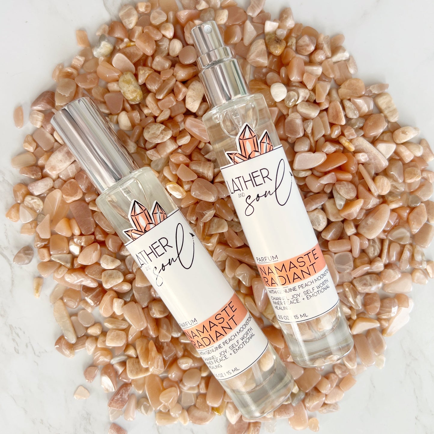 "Namaste Radiant" fine fragrance from Lather and Soul, with genuine peach moonstone crystals.