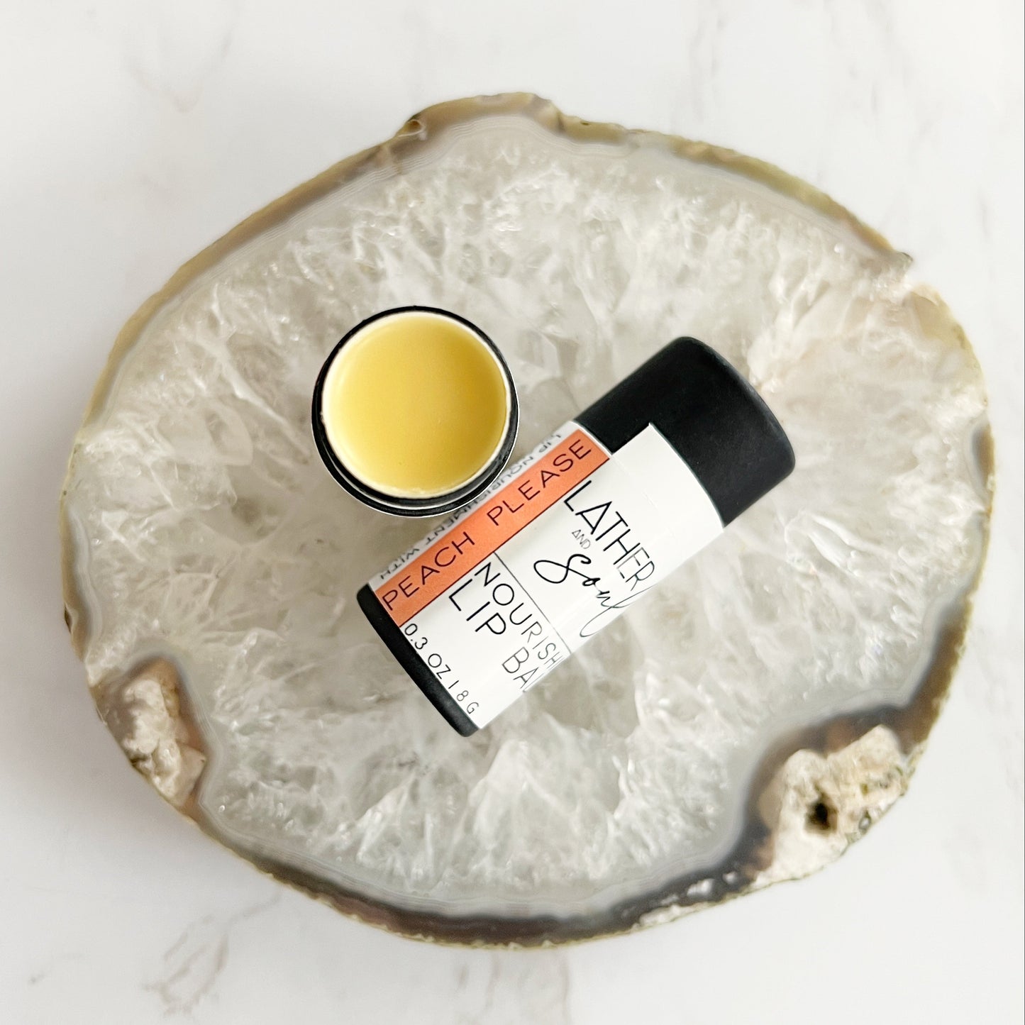 "Peach Please" scented lip balm with organic ingredients
