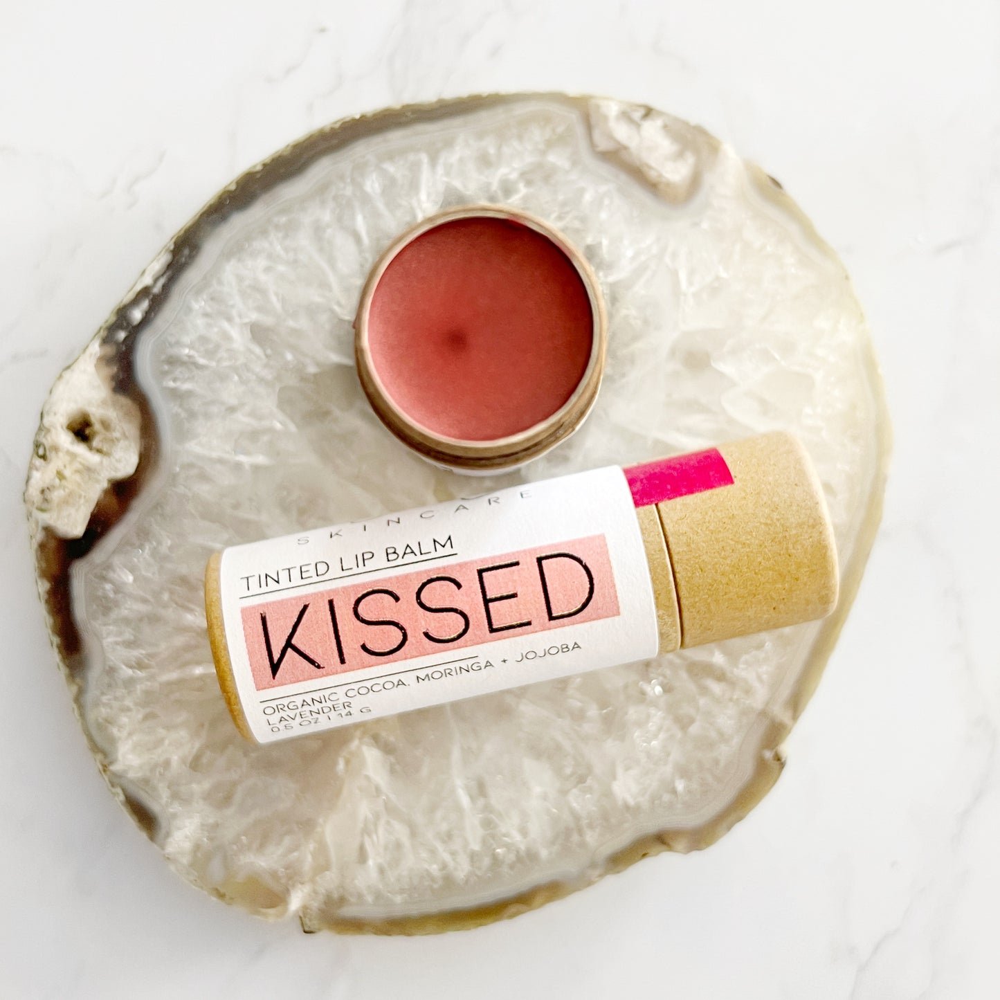 “Kissed” tinted lip balm in rose gold from Lather and Soul