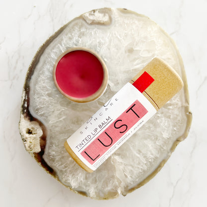 Pink tinted lip balm made with organic ingredients by Lather + Soul.