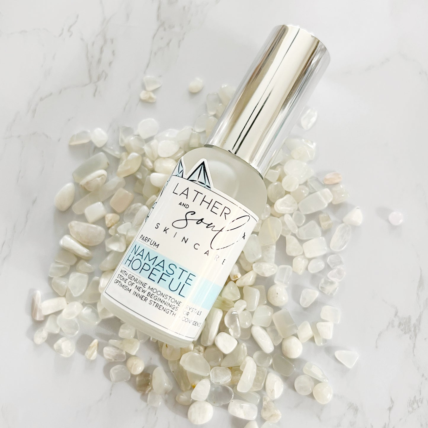 Luxury parfum from Lather and Soul, infused with genuine moonstone crystals.