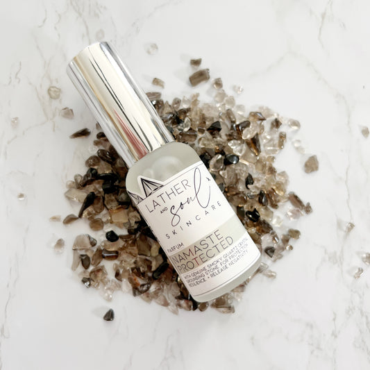 Luxury perfume from Lather and Soul infused with genuine smoky quartz