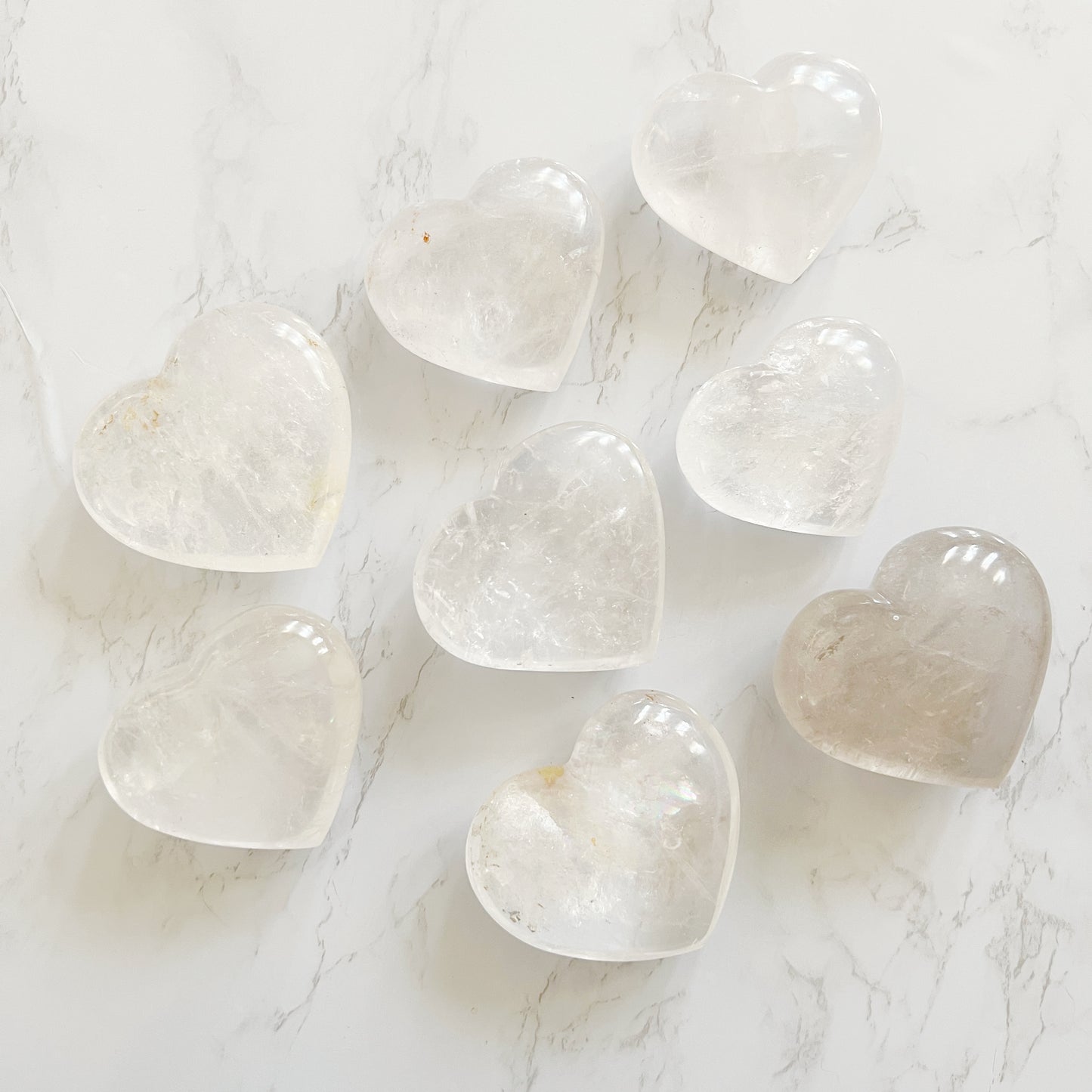 Collection of clear quartz crystal hearts