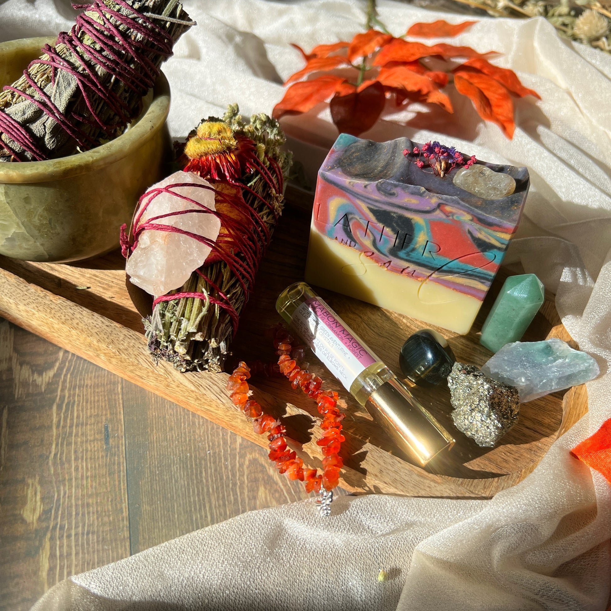A collection of body care and crystals for Mabon celebrations