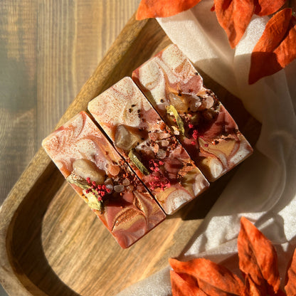 Handmade soap with organic ingredients, with botanicals and crystals on top