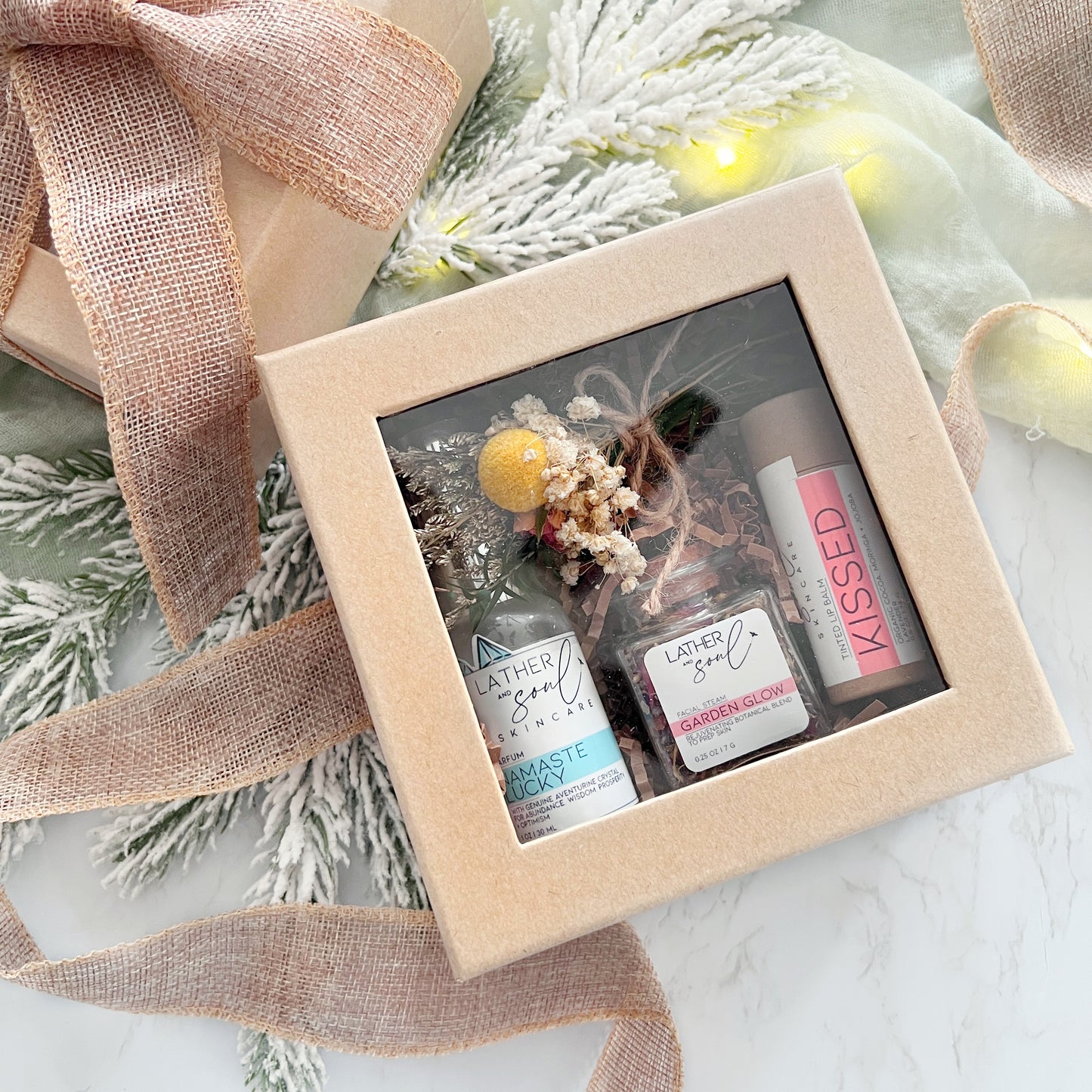 The perfect gift set for the holidays with perfume, tinted lip balm, facial steam, and a mini dried floral bouquet, from Lather and Soul