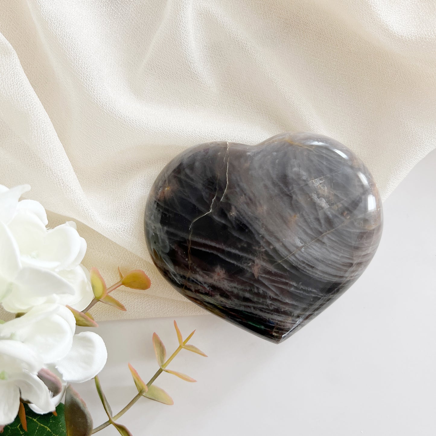 Gorgeous black moonstone heart with shimmer.