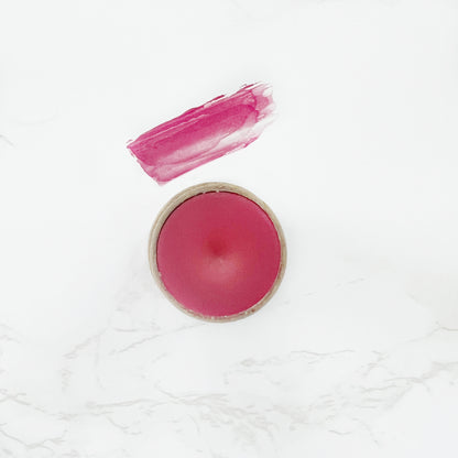 Tinted organic lip balm with cocoa and jojoba handmade by Lather + Soul.